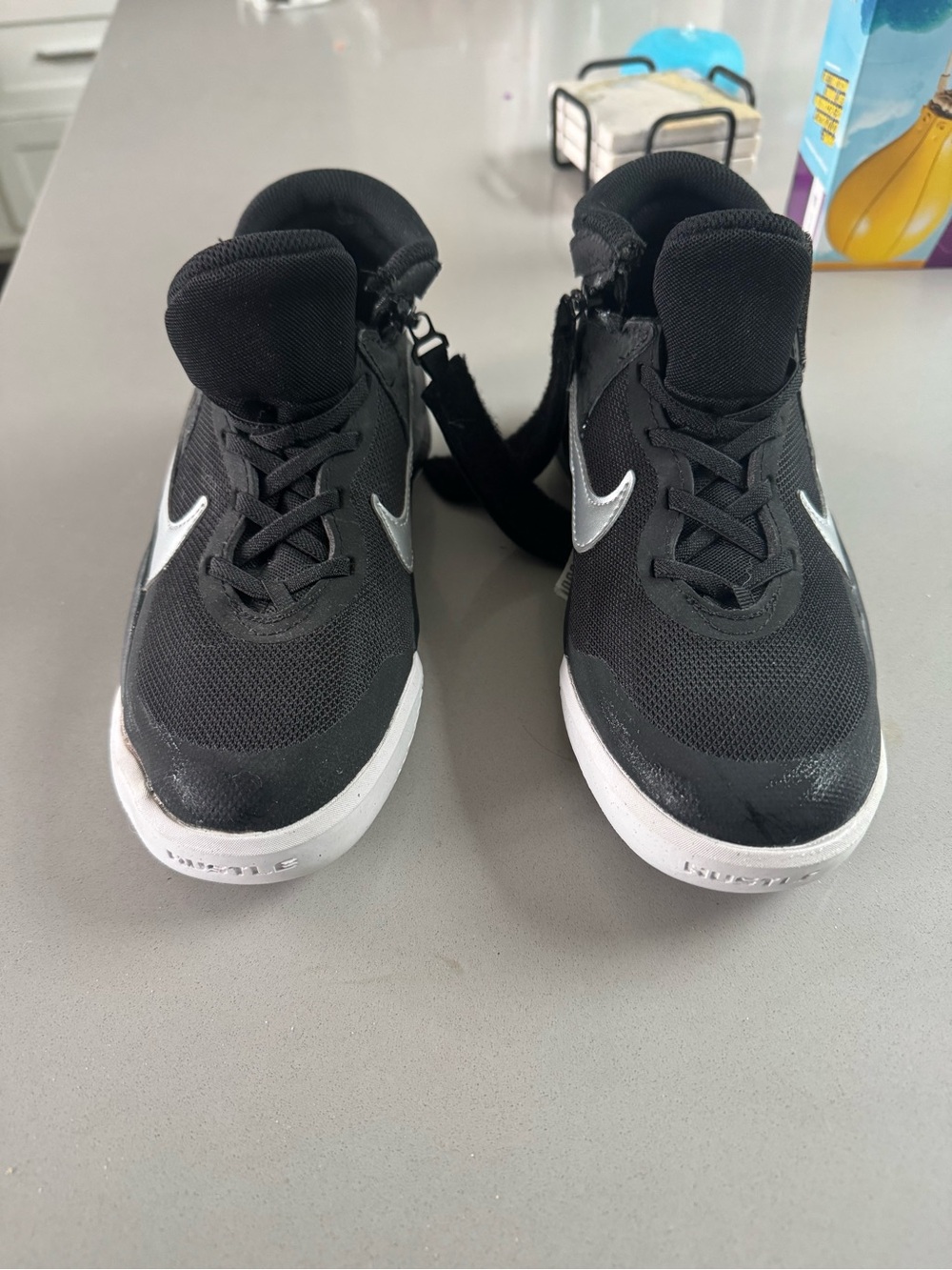 Nike Kids Black and White Sneakers with Silver Swoosh